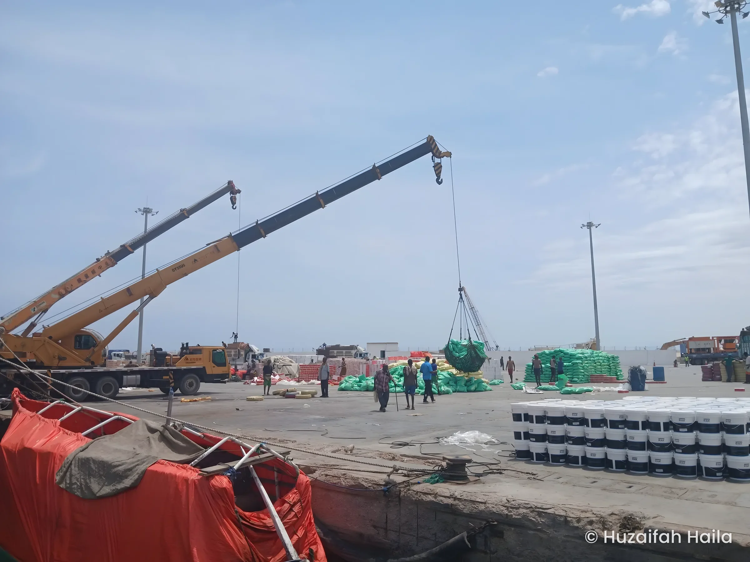 Cranes loading cargo on quay, Bosaso Port, Somalia